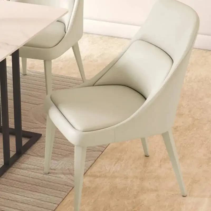 Cadeira de jantar moderna branca com design ergonômico e pernas finas