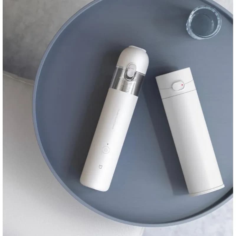 Aspirador de pó portátil XIAOMI MIJIA branco em fundo azul