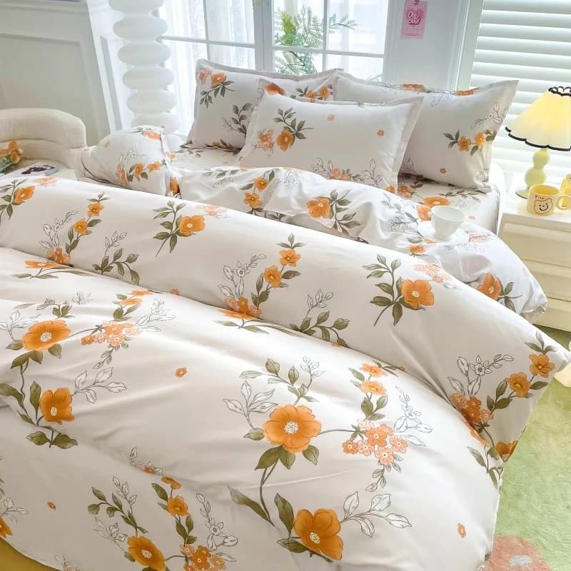Conjunto de cama floral amarelo 4 peças full com estampa de flores amarelas e folhas verdes em ambiente claro