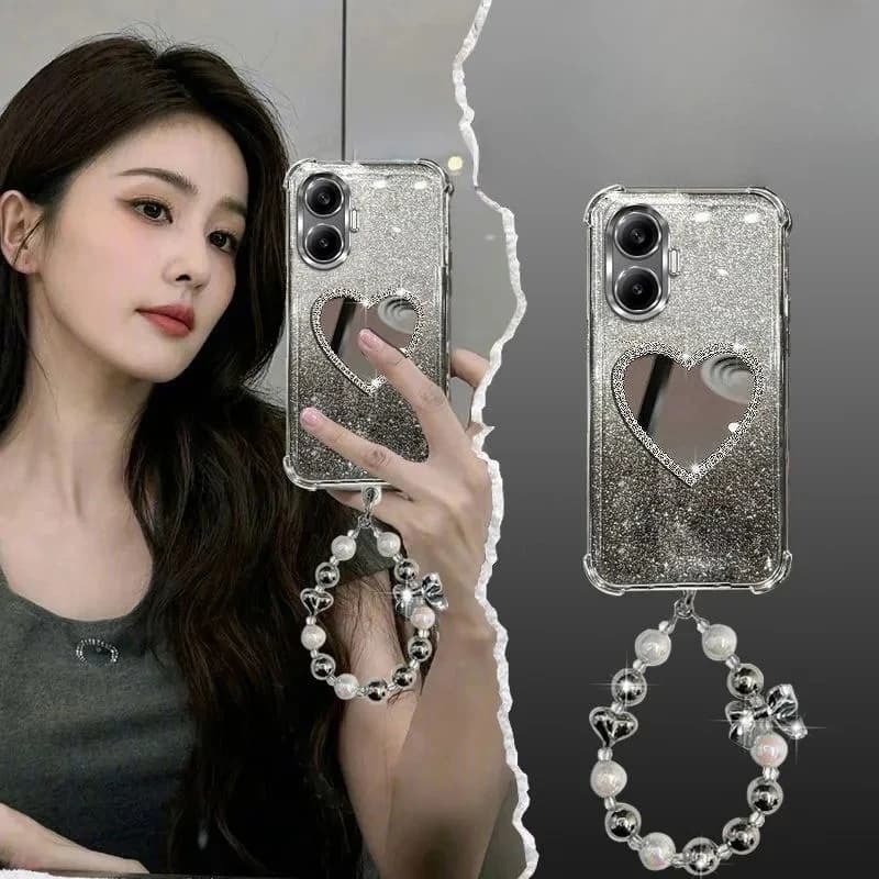 Capa de celular prateada com glitter e design de coração para iPhone