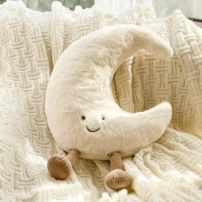 Almofada de pelúcia decorativa lua branca com rosto sorridente e pernas marrons em tecido macio