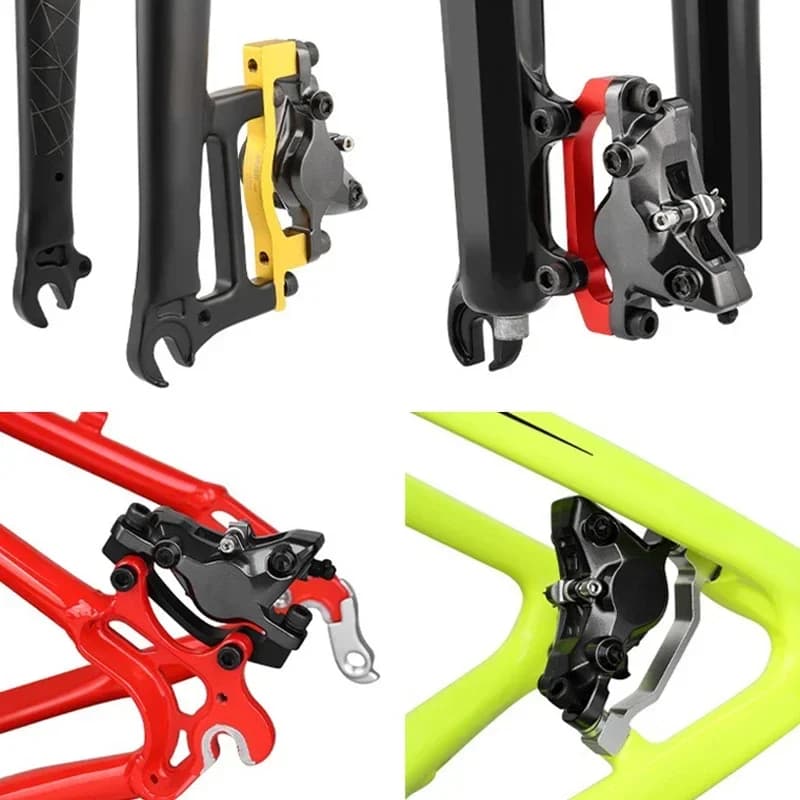 Adaptadores de montagem de pinça de freio a disco para bicicleta em cores amarelo, vermelho, preto e prata