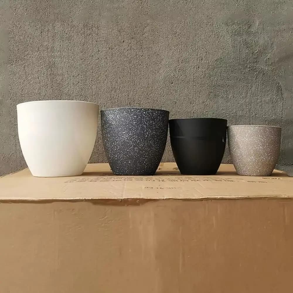 Vasos de plástico criativos para bonsai com acabamento fosco e imitação de pedra em cinza, preto, branco e marrom.