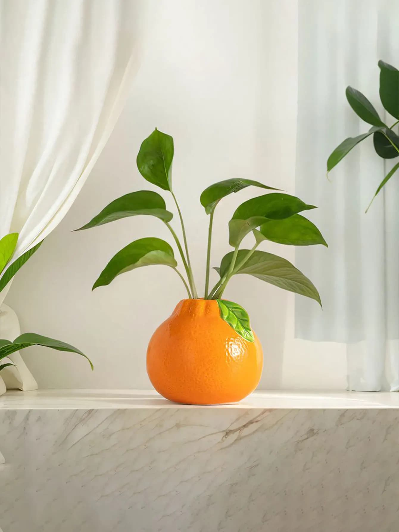 Vaso criativo de cerâmica laranja para decoração de mesa