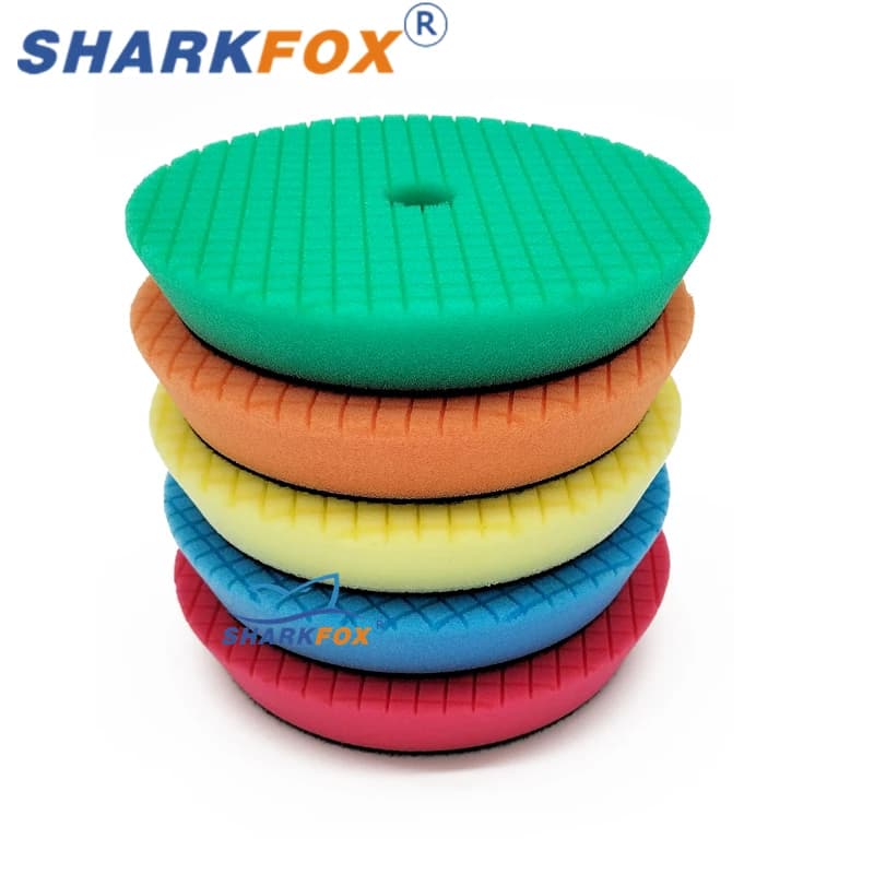 Pilhas de almofadas de polimento Sharkfox coloridas em espuma com textura quadriculada e furo central