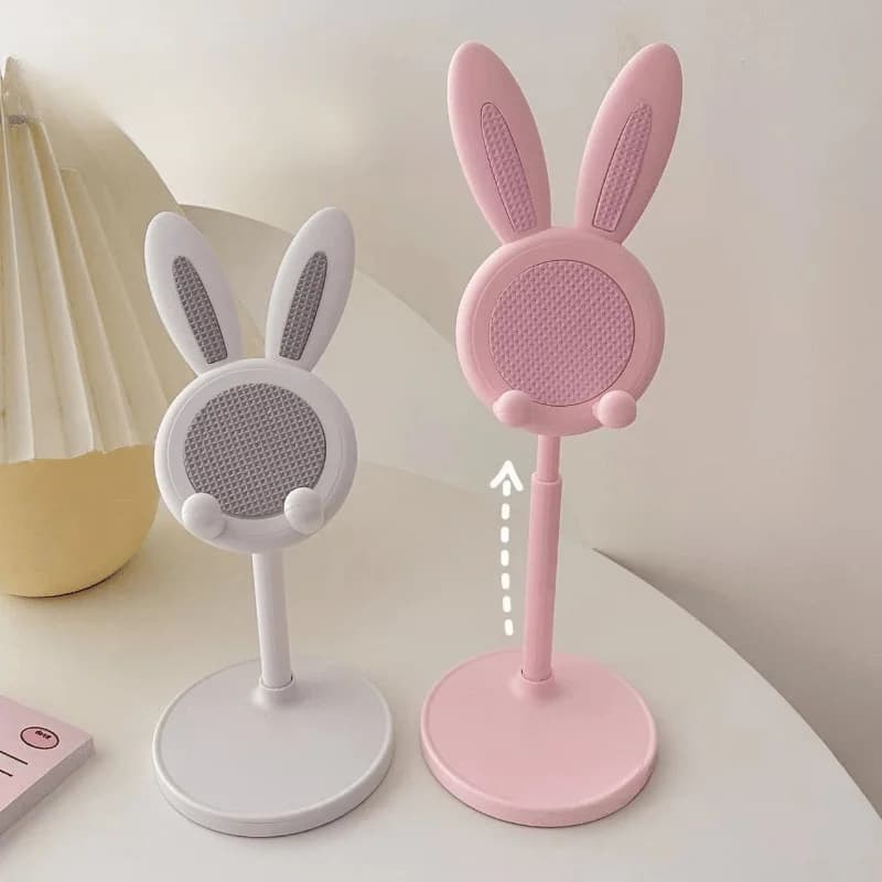 Suporte para celular coelho ajustável em branco e rosa com base redonda para mesa