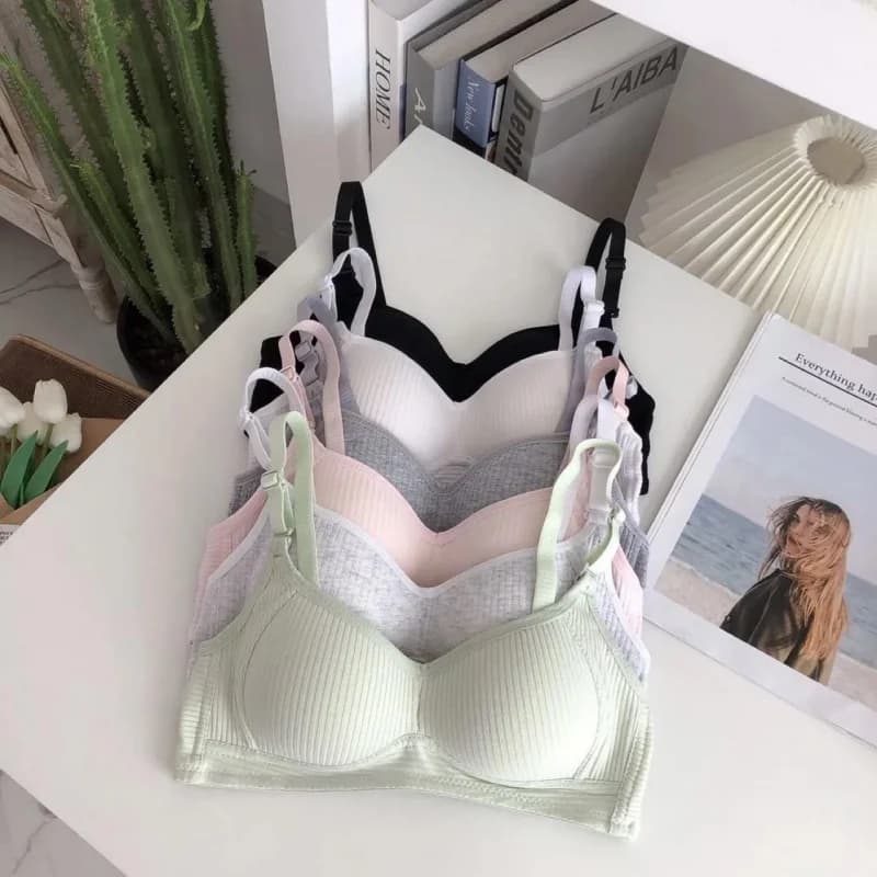 Conjunto de sutiãs juvenis sem aro em várias cores incluindo preto, branco, cinza, rosa e verde claro