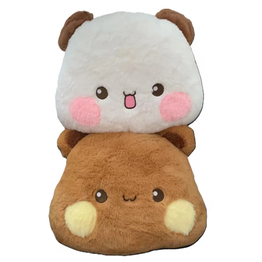 Travesseiro de pelúcia fofo com design de panda e urso, branco e marrom, ideal para decoração e conforto.