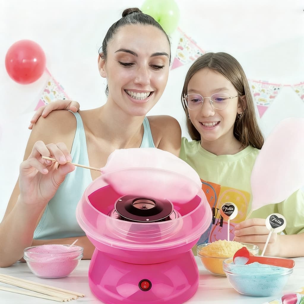 Máquina de algodão doce rosa para crianças, cenário de festa infantil com balões e tigelas de açúcar