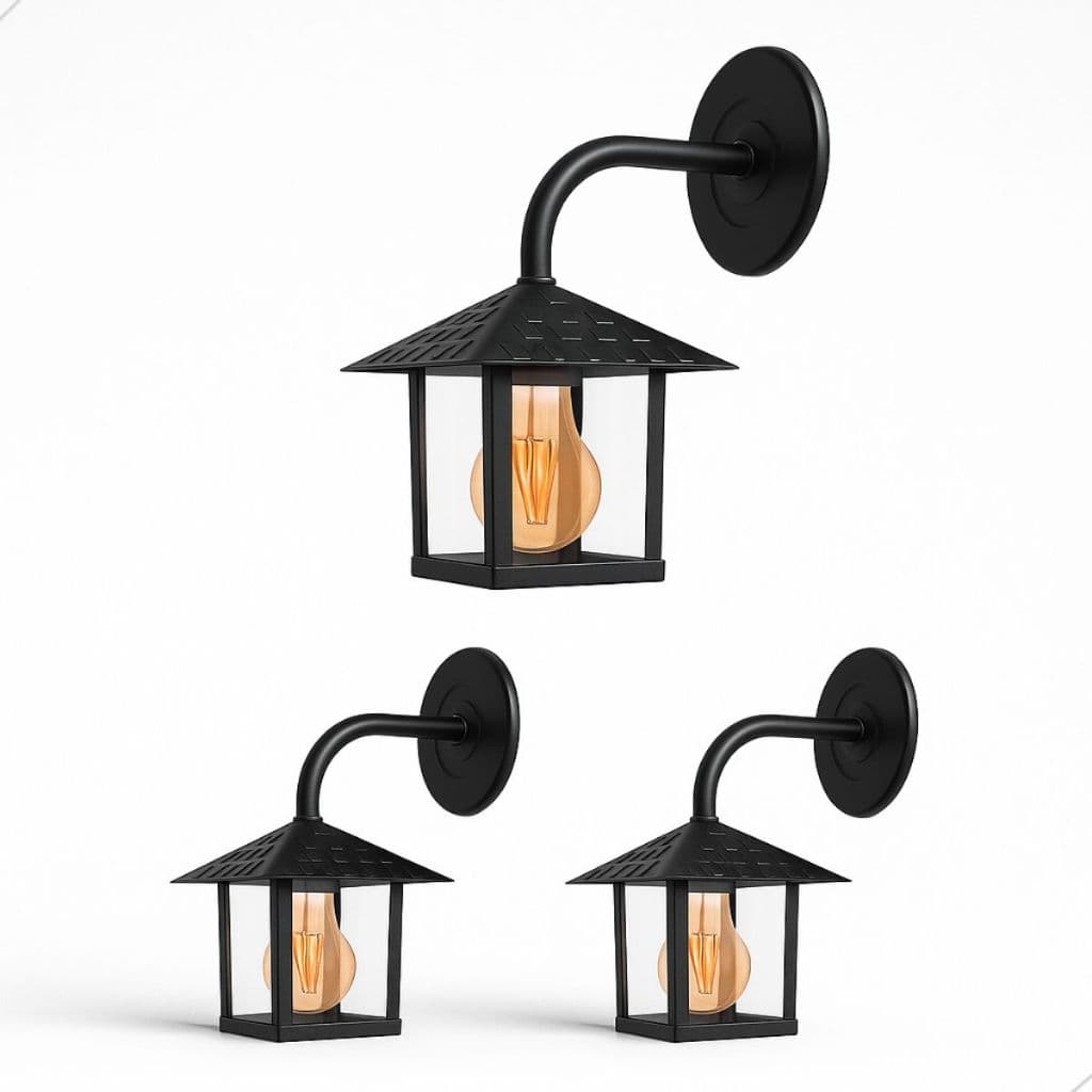 Luminárias de parede pretas com cúpulas em vidro e lâmpadas incandescentes