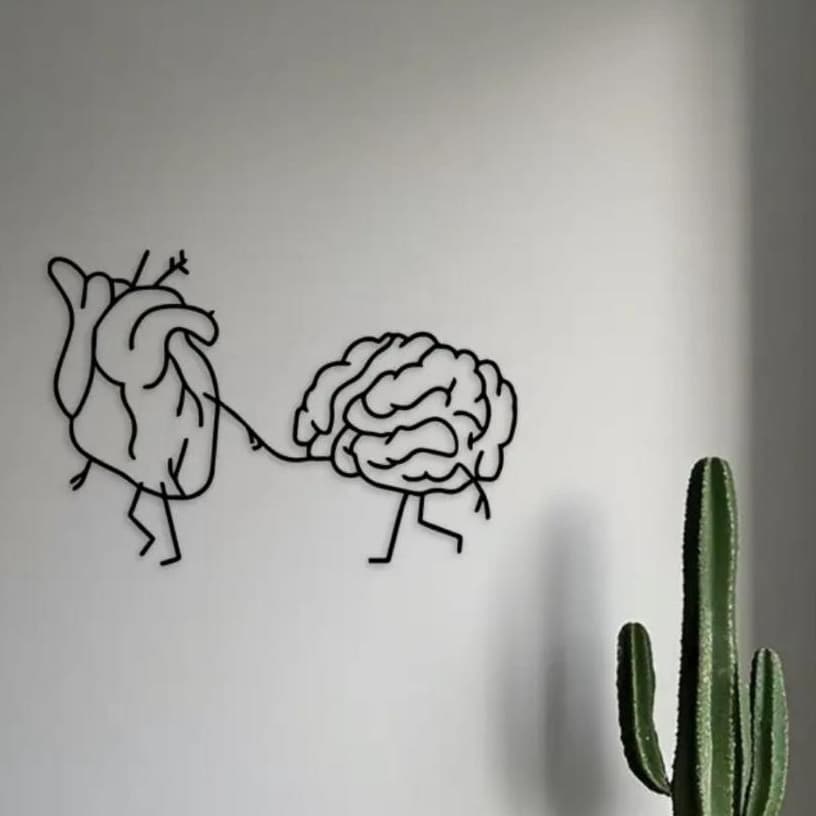 Quadro decorativo minimalista com coração e cérebro em preto e branco