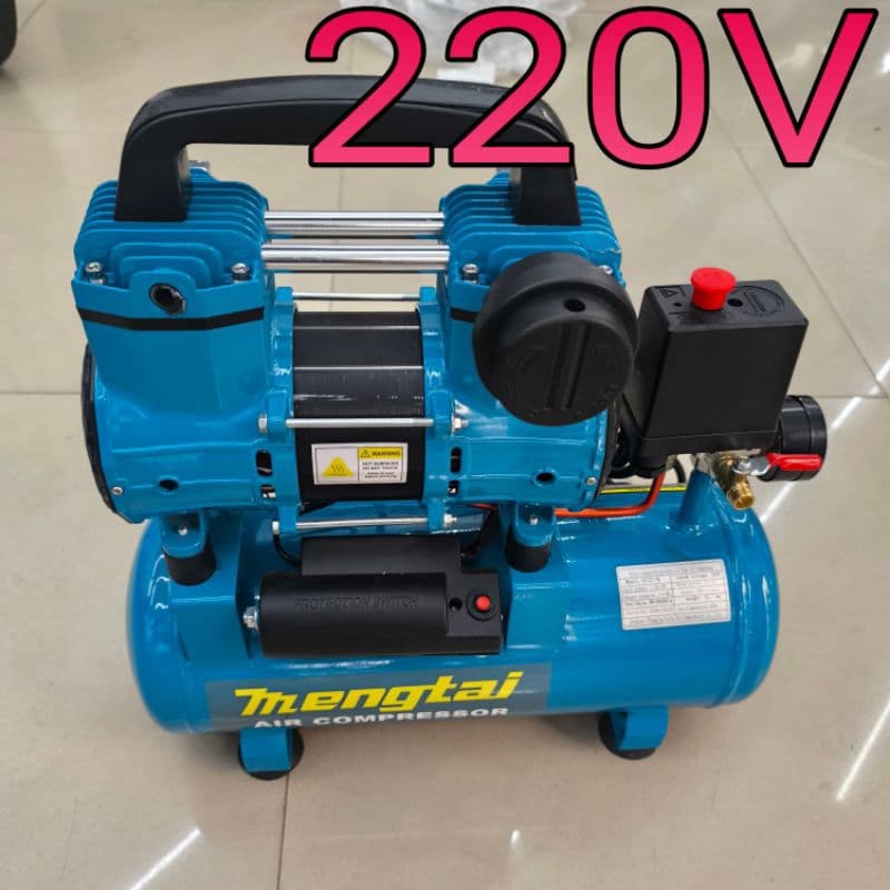 Compressor de ar portátil 220V azul e preto, silencioso e sem óleo, em piso branco
