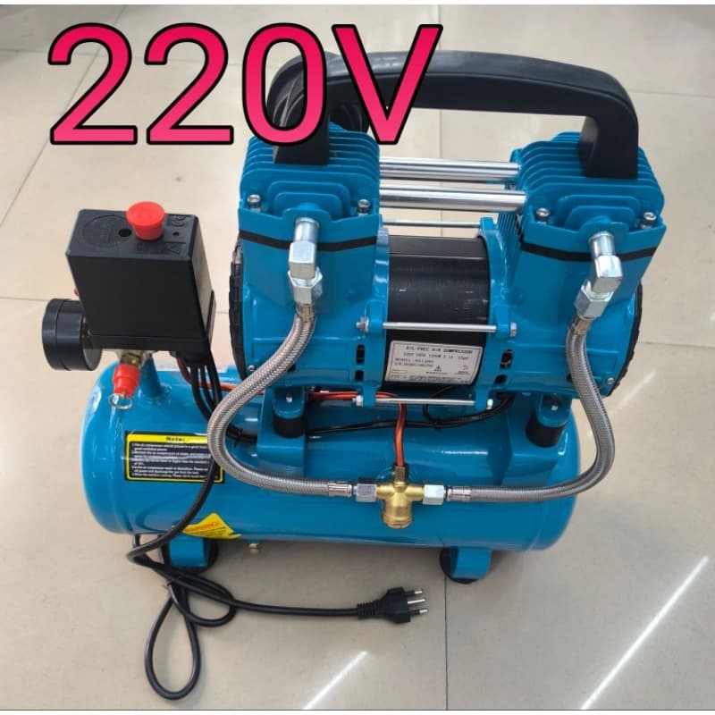 Compressor de ar portátil 220V azul, silencioso e sem óleo, com mangueira e botão vermelho, fundo claro.