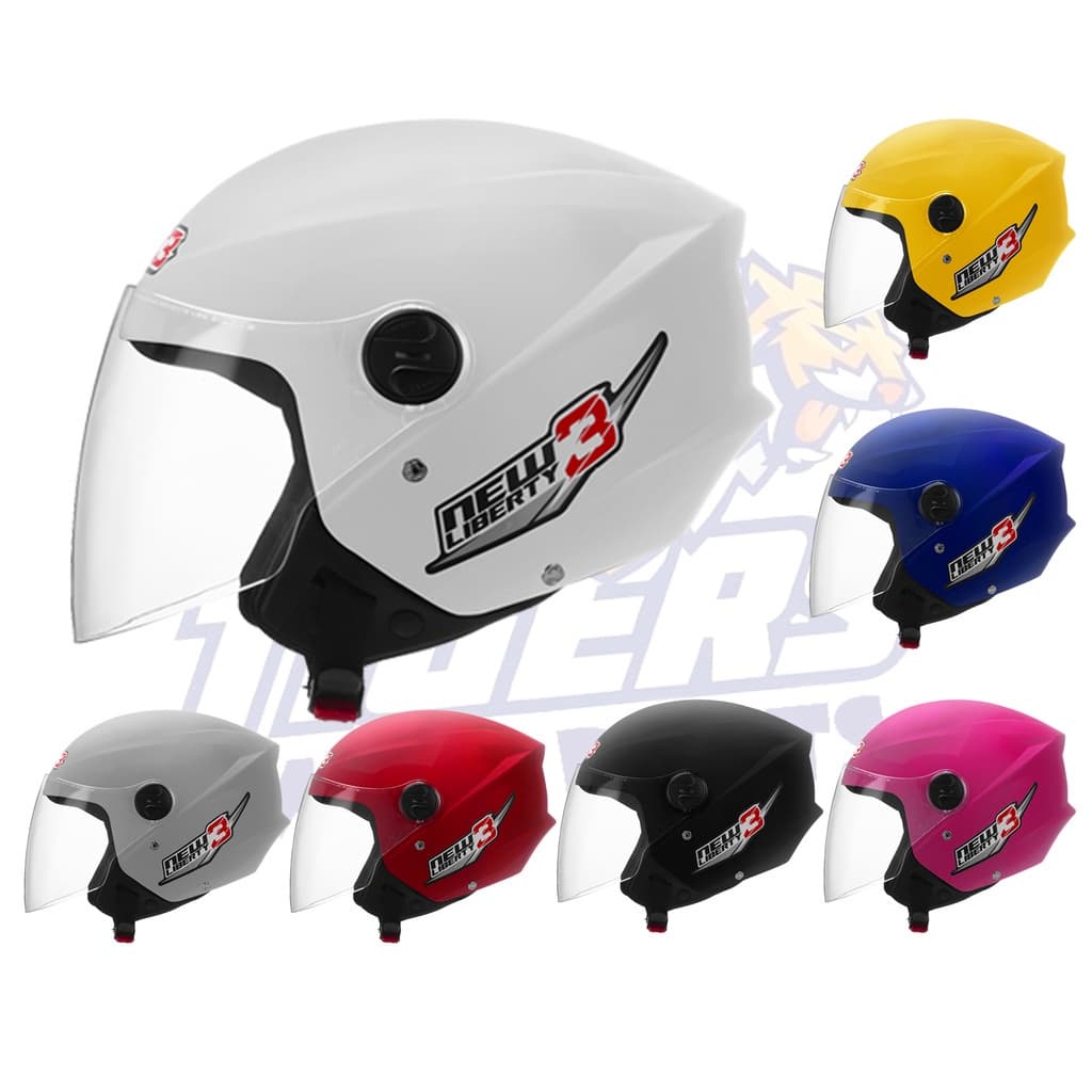 Capacetes de moto New Liberty 3 em várias cores: branco, amarelo, azul, preto, vermelho e rosa, com viseira transparente e logotipo preto e vermelho.