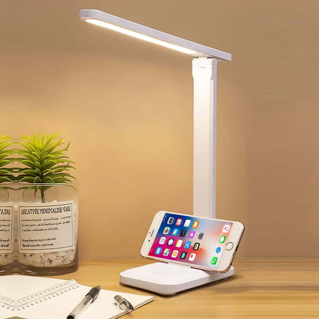 Luminária de mesa LED articulada branca com base de carregamento para celular