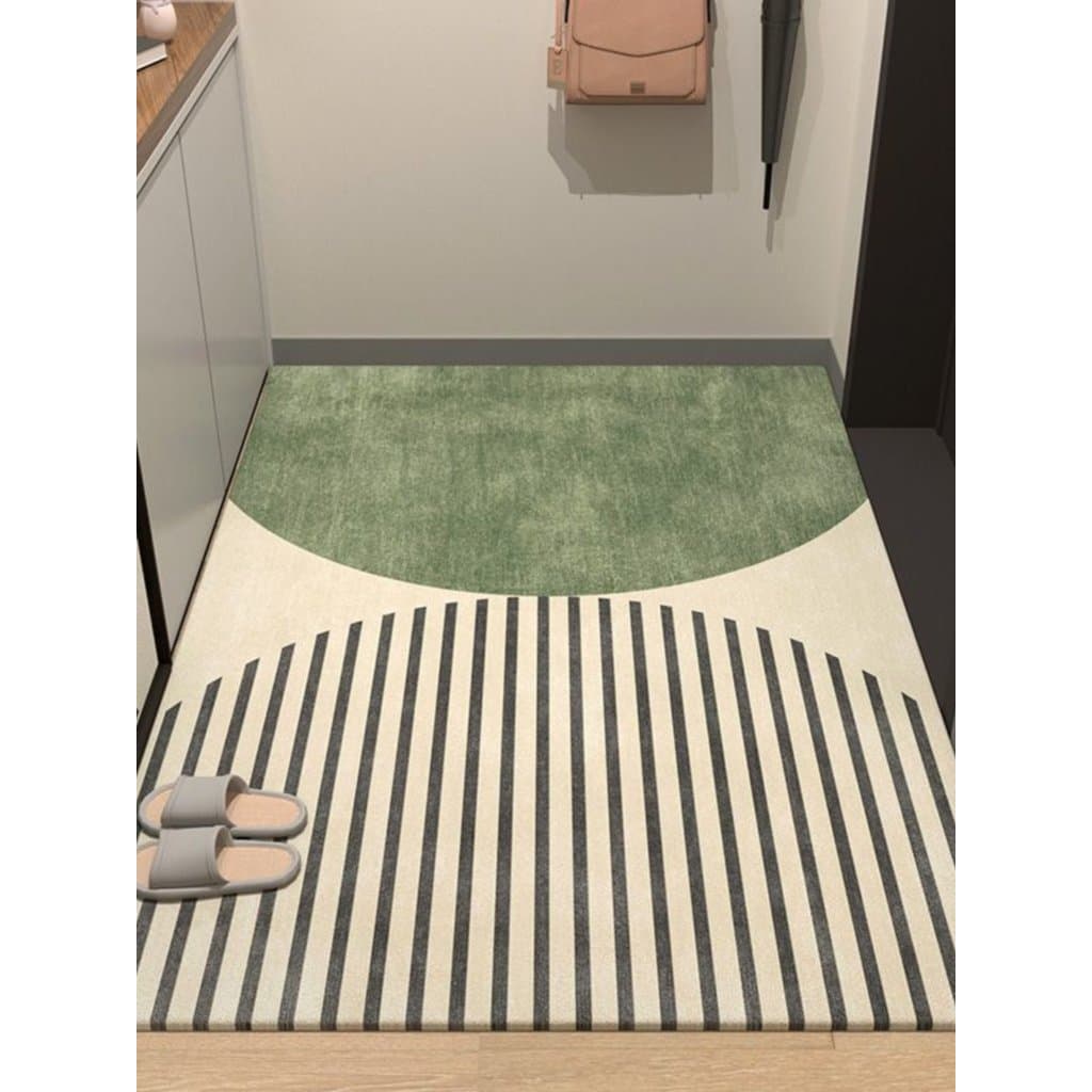 Tapete antiderrapante de entrada com design circular verde e faixas pretas e brancas
