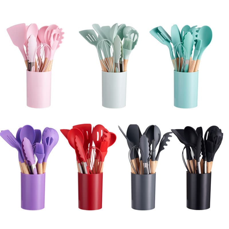 Conjunto de 12 espátulas e colheres de silicone em cores pastel, organizadas em cilindros coloridos.
