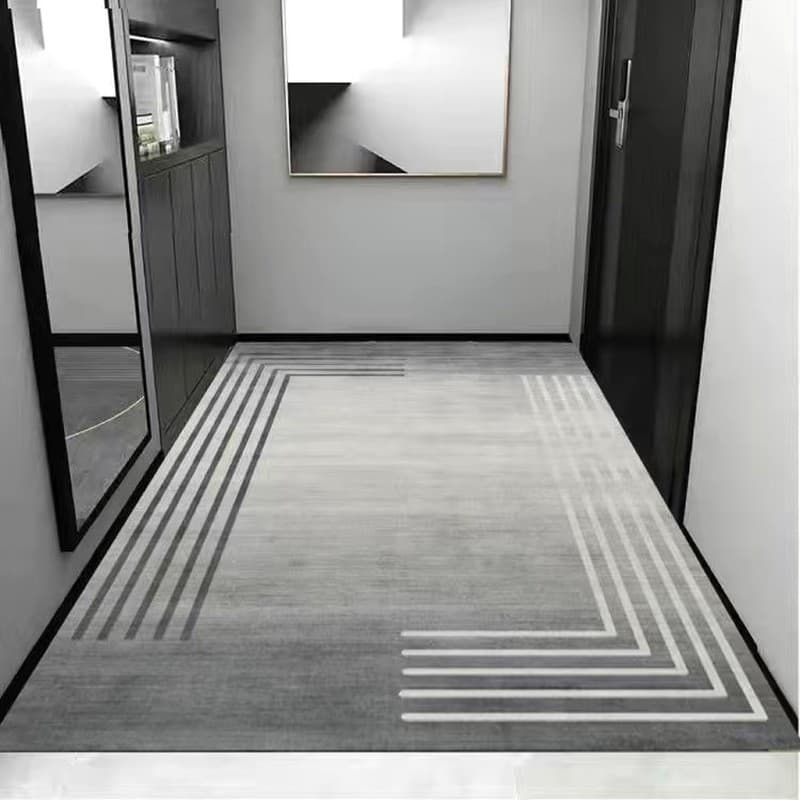 Tapete de entrada cinza e branco com padrão geométrico para porta de entrada