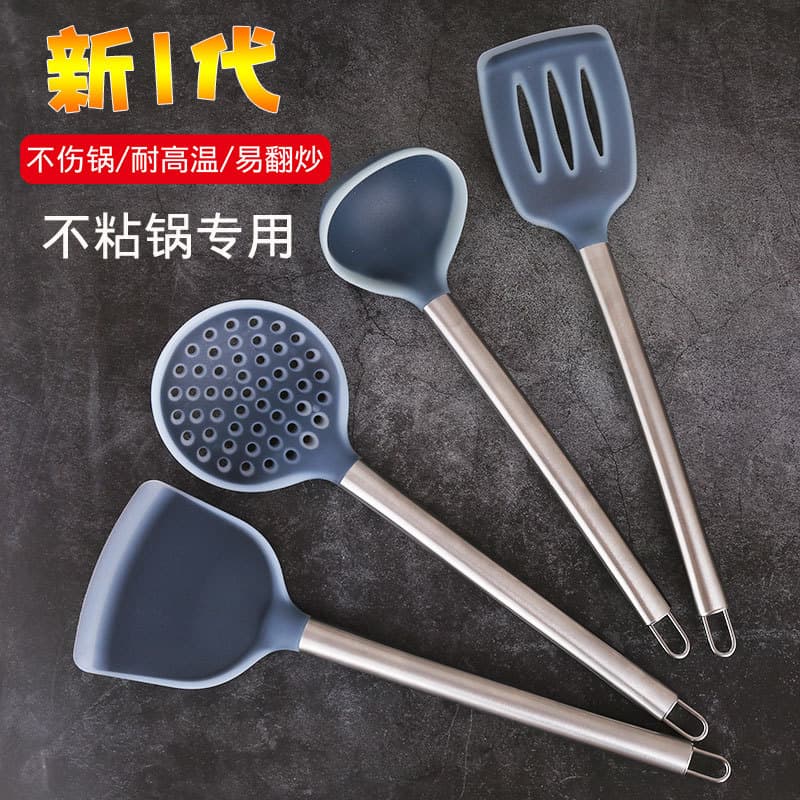 Set de três espátulas de silicone com cabos de metal, fundo cinzento