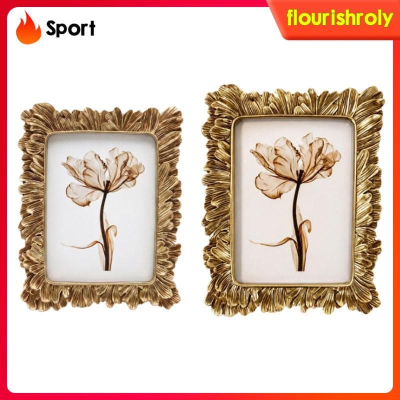 Porta-retratos vintage dourado com flor marrom em moldura elegante