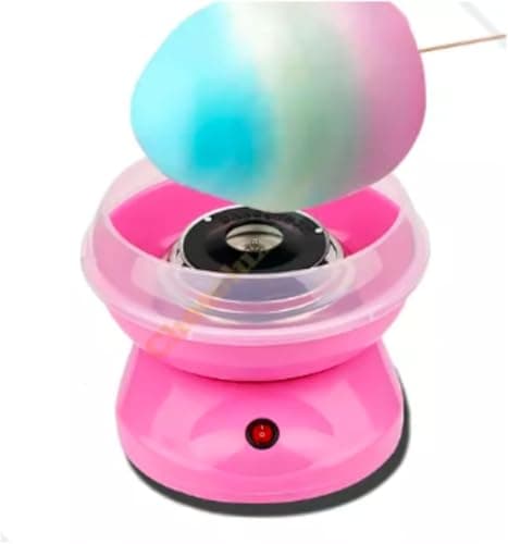Mini máquina de algodão doce rosa em funcionamento com algodão doce colorido