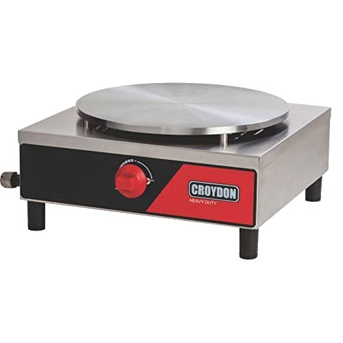 Máquina para panquecas a gás simples Croydon com superfície em aço inoxidável e fundo preto.