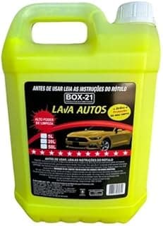 Garrafa de detergente automotivo lava autos 5 litros, amarela fluorescente, com tampa branca, etiqueta preta com texto vermelho e branco.