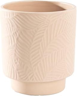 Vaso de cerâmica bege com padrão de linhas onduladas