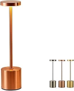 Abajur moderno com acabamento em cobre, base cilíndrica e luz amarela suave no topo, disponível em prata, cobre e ouro.