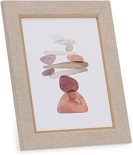 Porta-retratos 15x20 com moldura dourada e fundo bege contendo imagem de pedras empilhadas