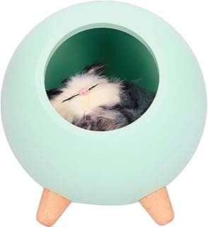 Cama esférica para gatos verde-pálida com gato de pelúcia dentro
