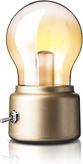 Luminária de mesa vintage com base dourada e vidro amarelado