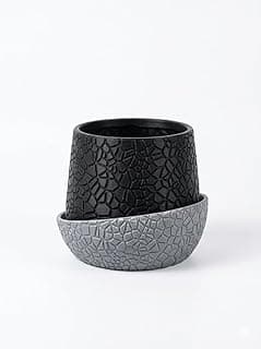 Vaso decorativo preto e prata com textura geométrica e base