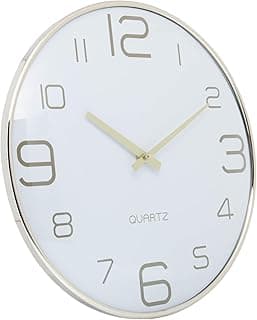 Relógio de parede branco com mostrador circular e números pretos, borda dourada, texto 'QUARTZ' no centro.