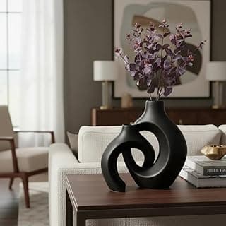 Vaso decorativo de cerâmica entrelaçado em preto com flores artificiais roxas