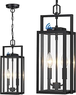 Luminária pendente externa preta com vidro transparente, iluminação interna acesa, vista frontal.