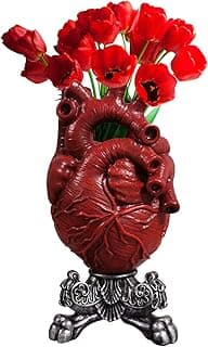 Vaso decorativo em forma de coração anatômico vermelho com flores vermelhas