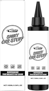 Frasco preto de spray de revestimento de veículos Shiny Car Stuff ao lado de sua caixa branca.