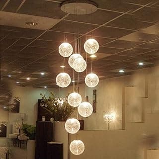 Lustre minimalista com esferas transparentes para sala de estar