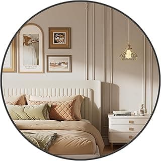 Espelho de parede redondo preto SONGMICS, refletindo quarto com cama e decoração.