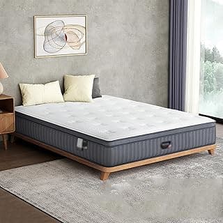 Colchão híbrido ergonômico cinza e branco com suporte zoneado em um quarto minimalista