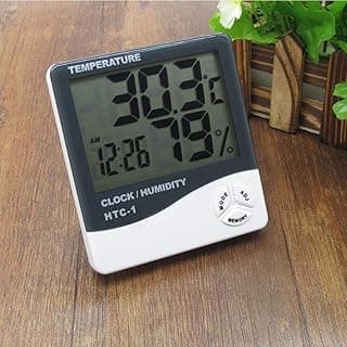 Relógio digital HTC-1 com higrômetro e termômetro, mostrando temperatura e umidade.