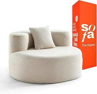 Poltrona circular de tecido bouclé off-white contra fundo branco, com almofada branca e caixa vermelha com texto 'sofa'.
