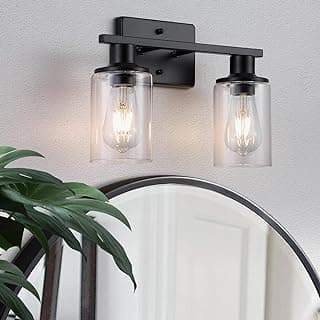 Luminária de banheiro preta fosca com dois vidros transparentes montada na parede acima de um espelho