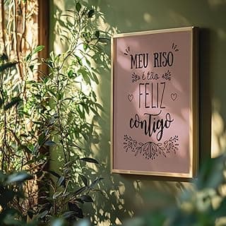 Quadro decorativo com frase romântica 'Meu riso é feliz contigo' em moldura dourada