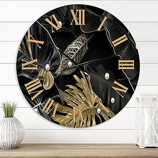 Relógio de parede grande preto e dourado com folhas tropicais, ideal para decoração de sala de estar