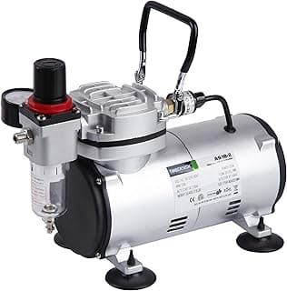 Compressor de aerógrafo AS18-2 da TIMBERTECH, frontal, prateado e preto, com tanque transparente, etiquetas técnicas, fundo branco