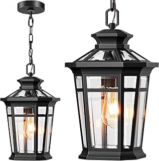 Luminárias pendentes pretas com corrente ajustável e vidro, iluminadas por lâmpadas incandescentes