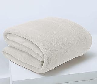 Manta de microfibra fleece branca dobrada, textura macia e uniforme, sobre fundo branco.