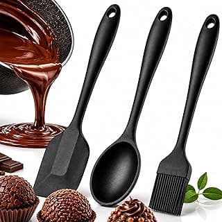 Jogo de utensílios de cozinha em silicone preto com espátula, colher e pincel culinário.